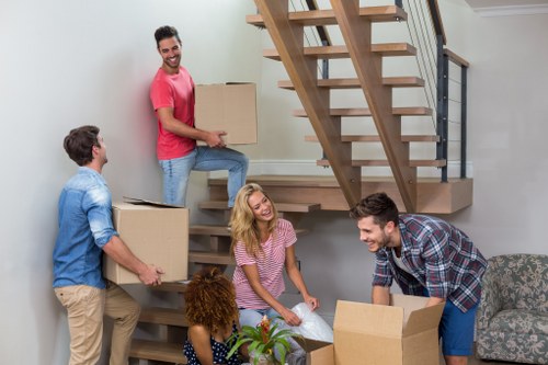 Staff handling a van with ethical labour compliance focus