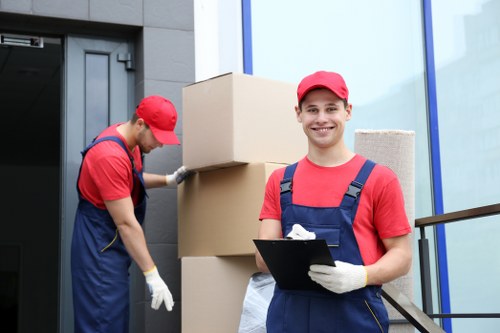 Packing and loading office furniture during a local relocation