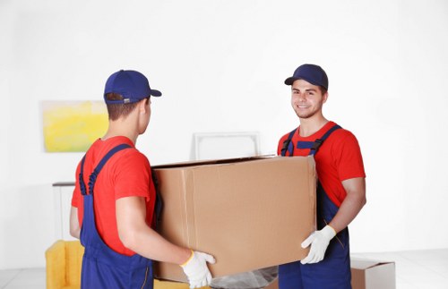 Furniture collection team loading bulky household items in Pinner