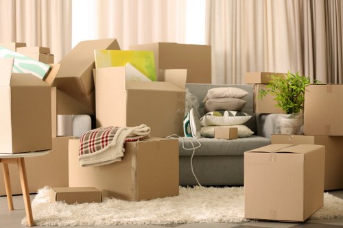 Professional movers loading boxes during an urgent relocation in Pinner