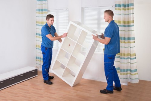 Boxes and furniture prepared for a man and van service in Pinner
