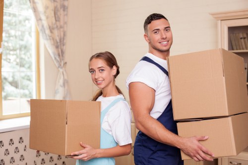 Carefully labelled moving boxes stacked for relocation in Pinner